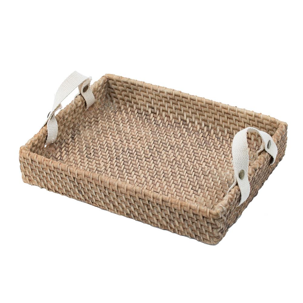 Woven wicker tray with white handles.