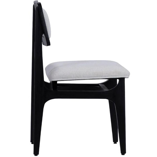 Modern chair with gray cushion and dark frame, viewed from the side.