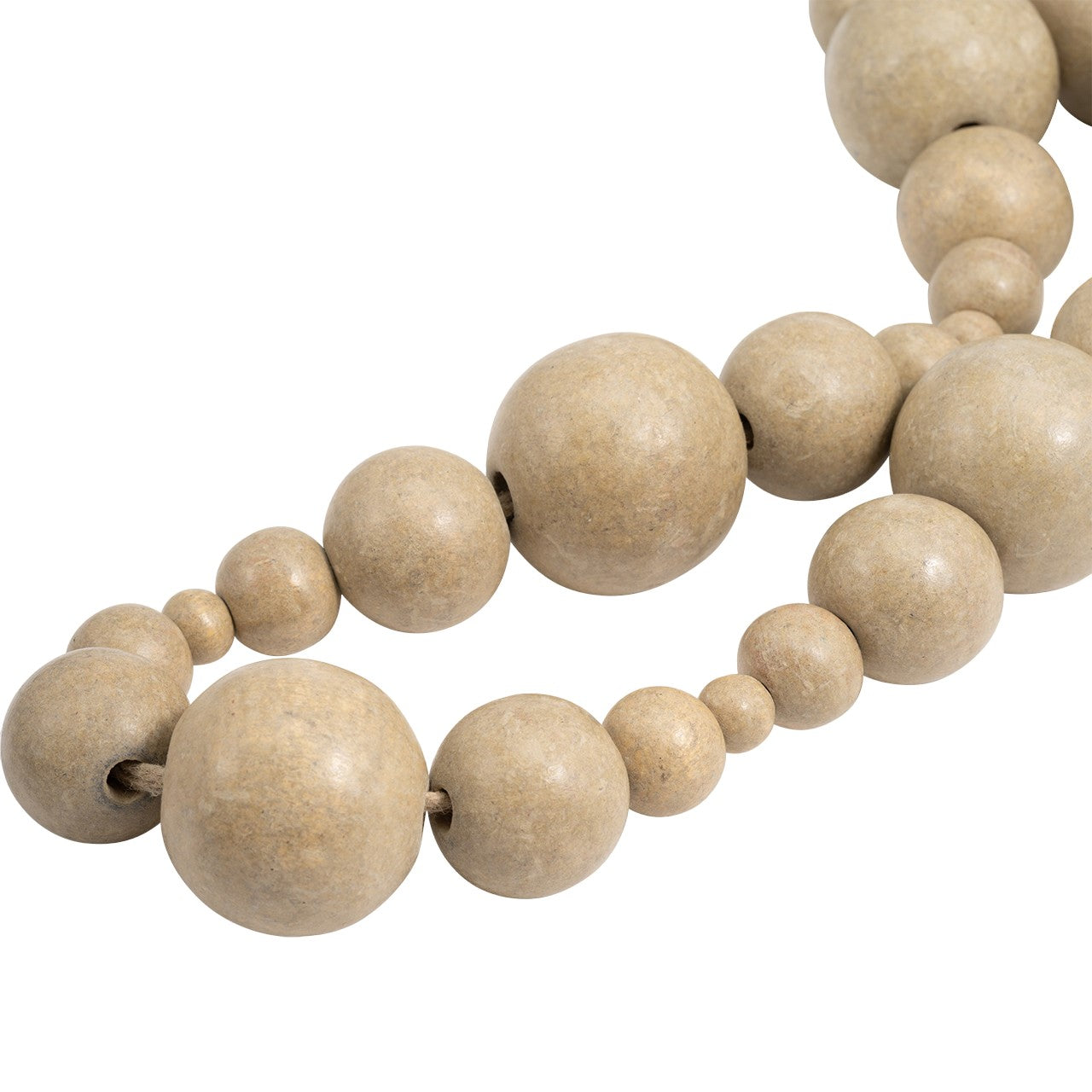 Beige wooden beads of varying sizes on a string.