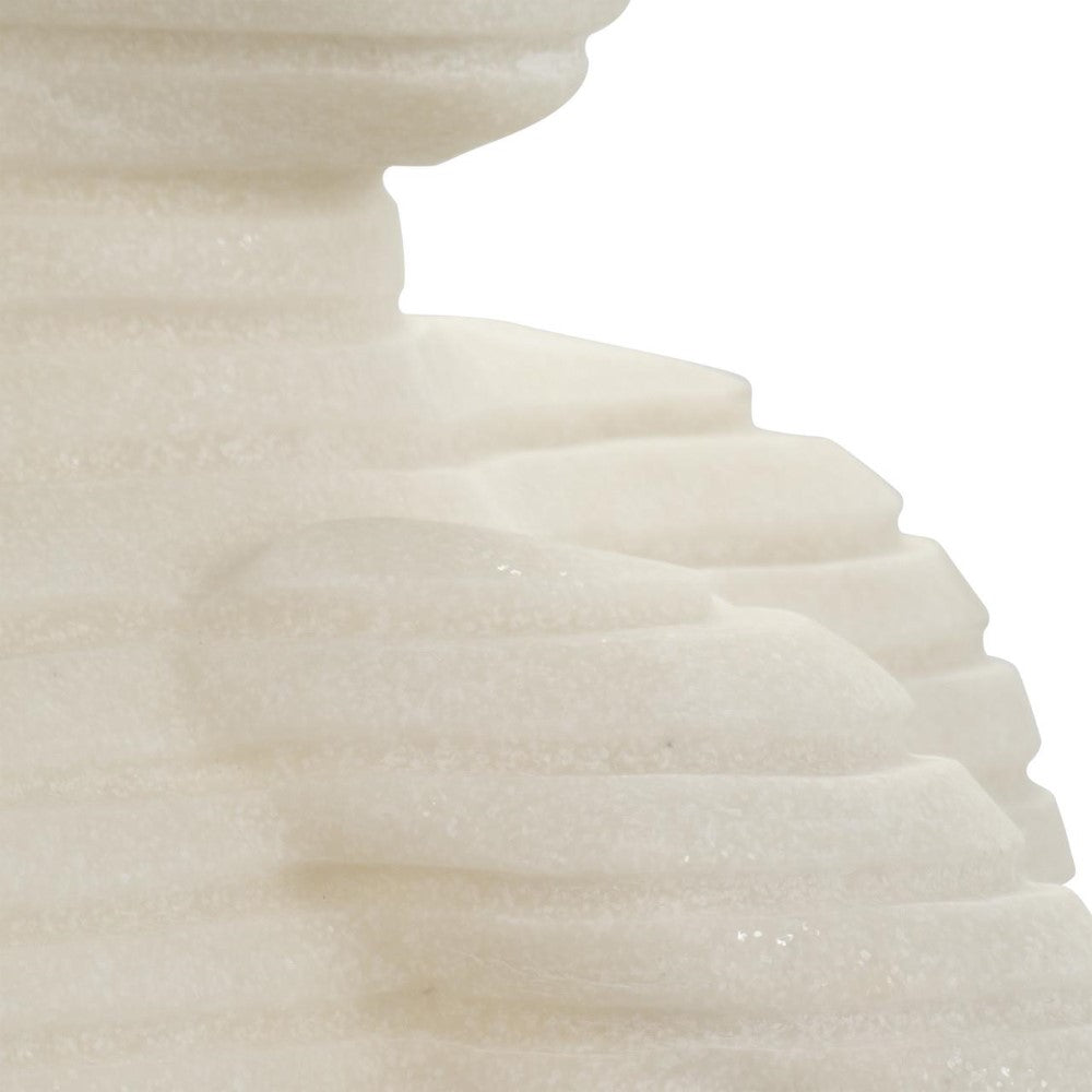 Abstract white, layered texture with a smooth, wavy surface.