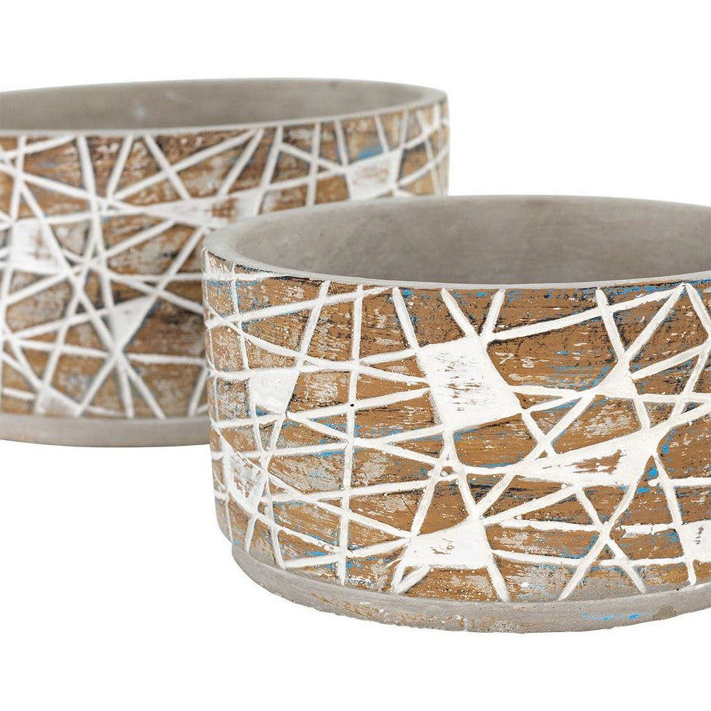 Geometric-patterned pots with a rustic design.