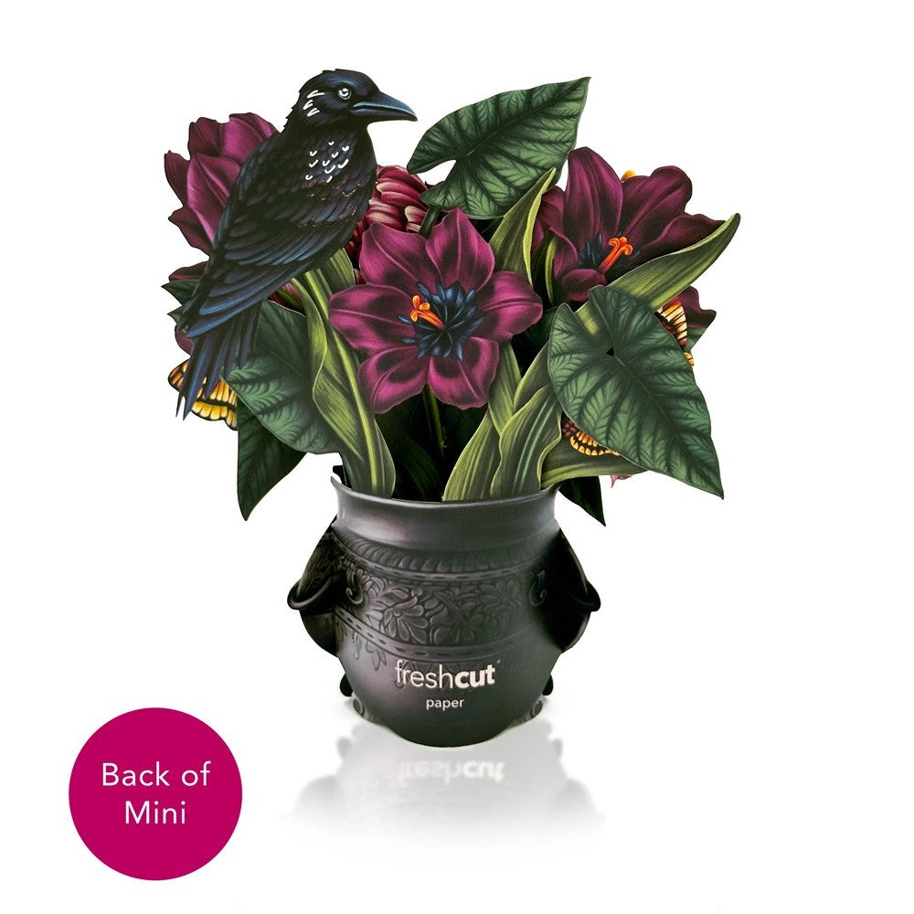 Black pot with purple flowers and a perched bird.