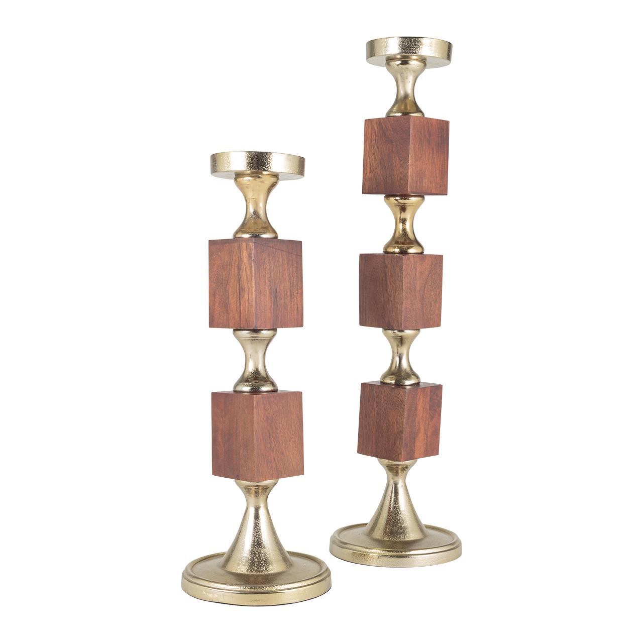 Two brass and wood block candle holders.