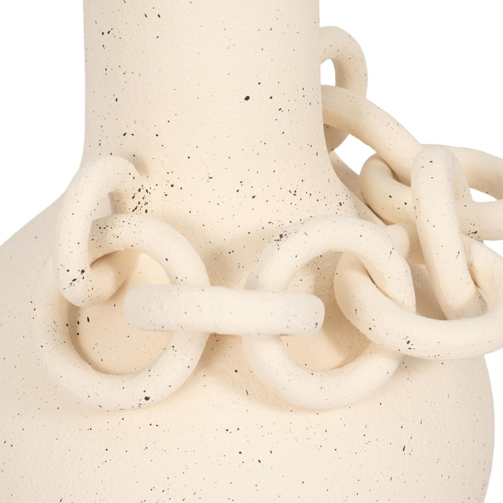 Creamy ceramic vase with textured links and black speckles.