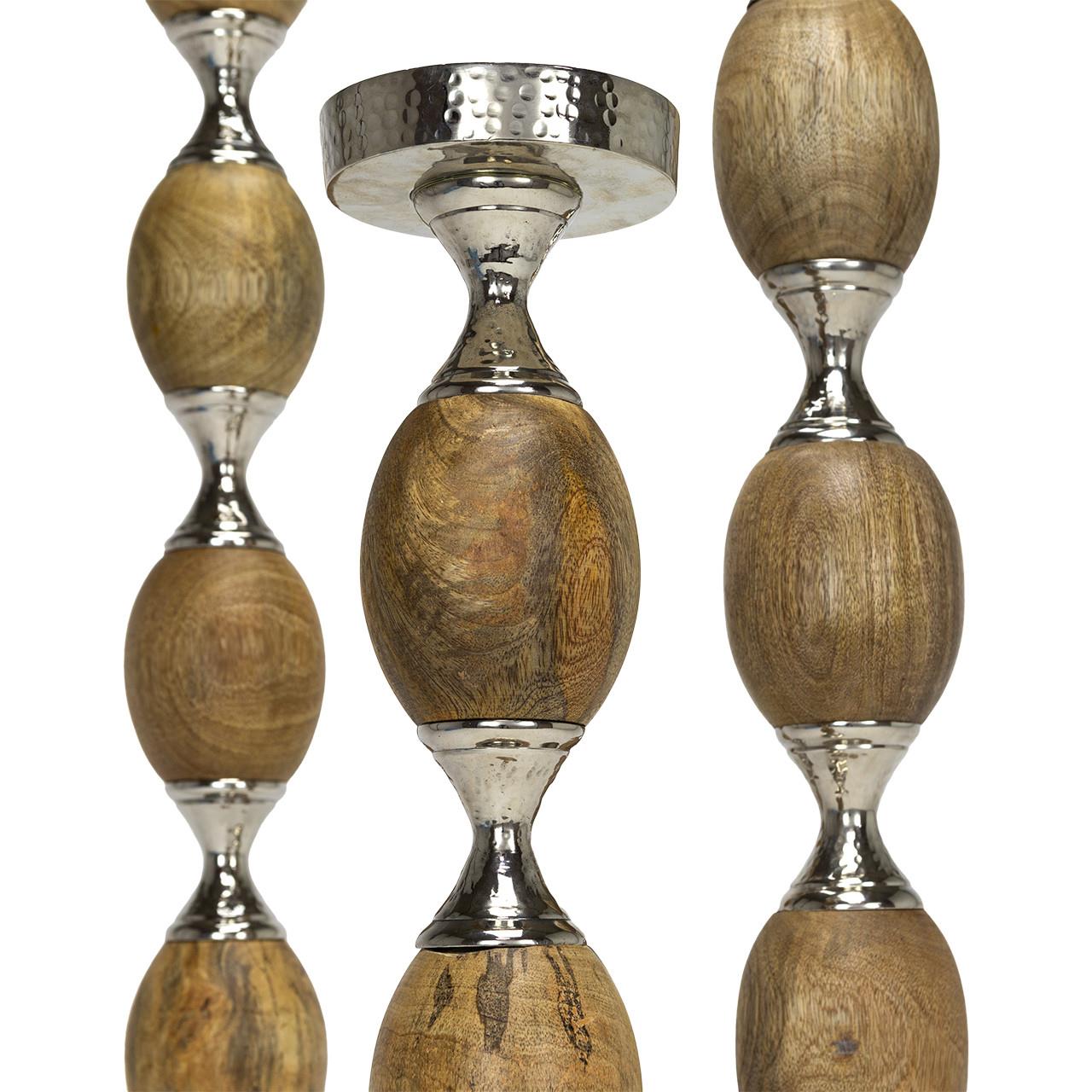 Wood and metal candle holders with a modern design.