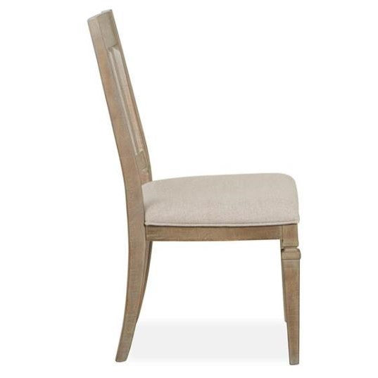 Wooden chair with beige cushion, side view.