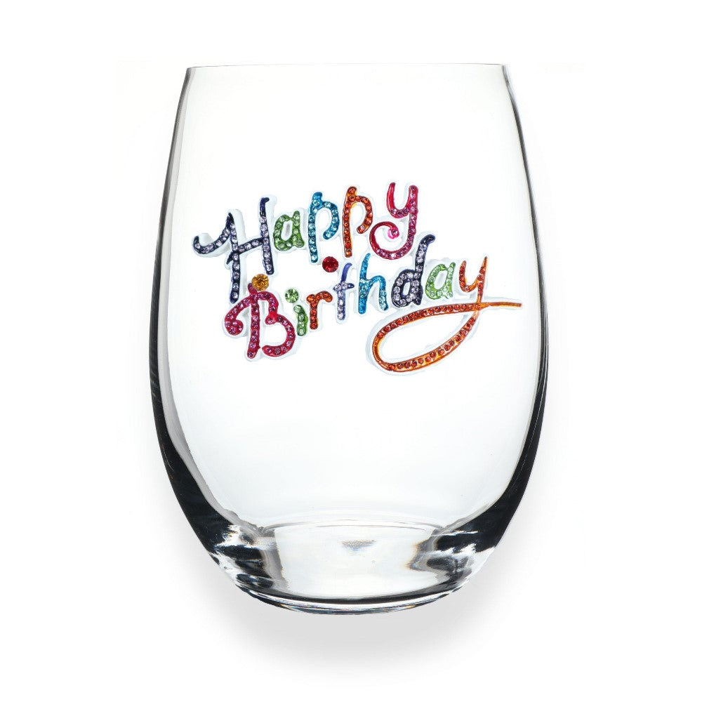 Glass with colorful "Happy Birthday" text design.