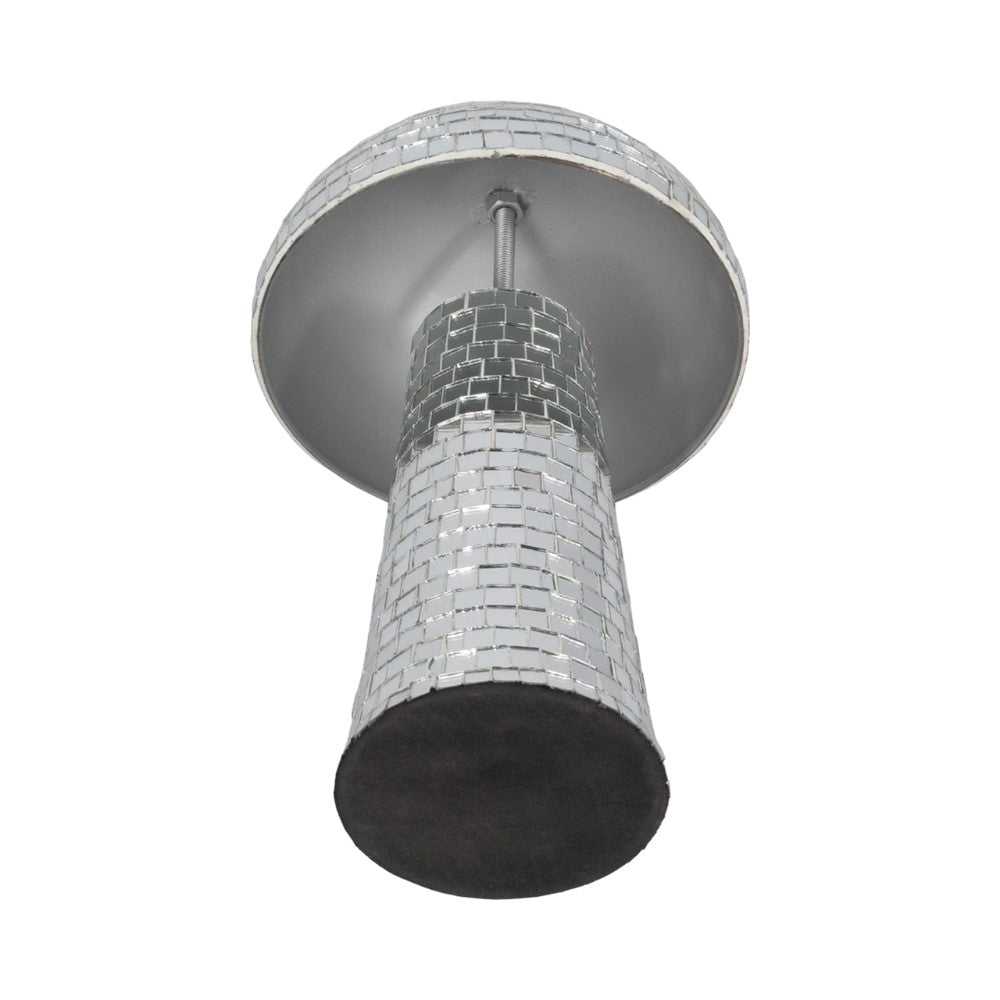 Mirrored goblet-shaped object with a checkered pattern.