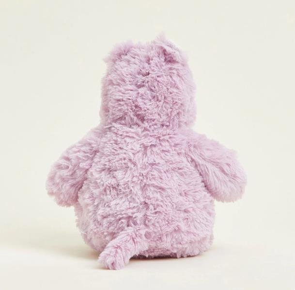 Fluffy lilac teddy bear viewed from the back.