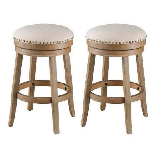 Two wooden stools with upholstered beige seats and nailhead trim.
