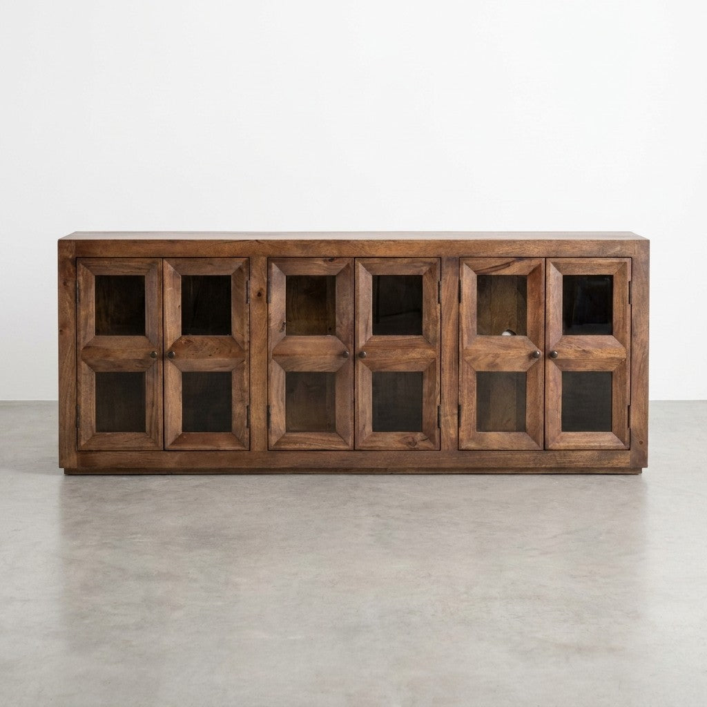 Wooden cabinet with four geometric glass doors, open to show interior shelves.