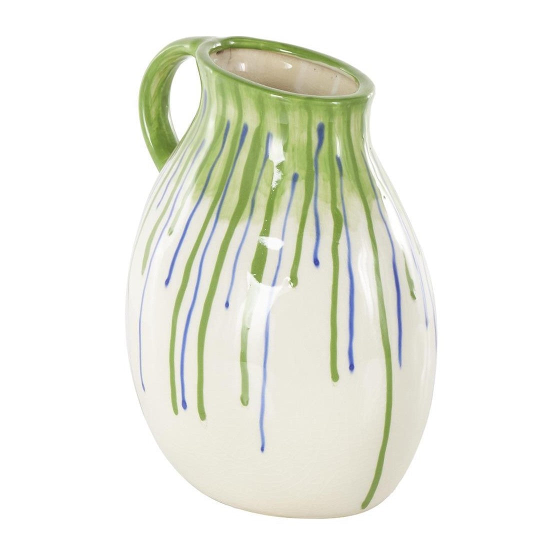 White ceramic pitcher with green and blue drips.