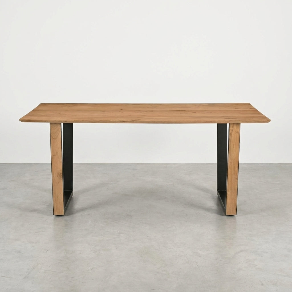 Wooden table with black metal legs on a white background.