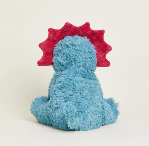 Fluffy blue dinosaur plush with a red crest, sitting backwards.