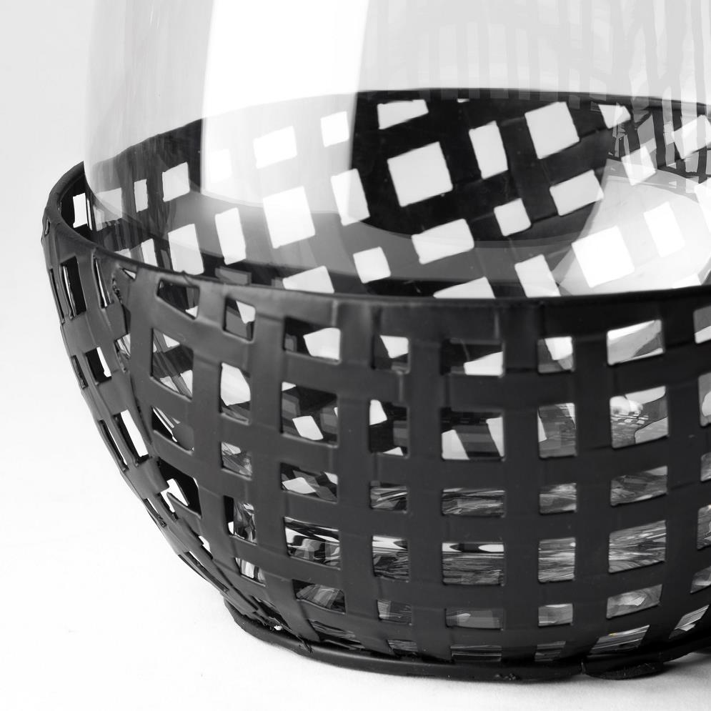Glass vase with black grid-patterned base.