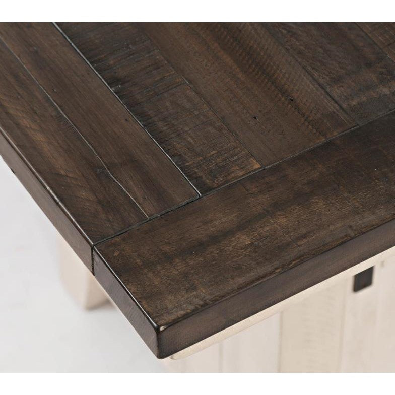 Close-up of a dark wooden tabletop with a textured finish.