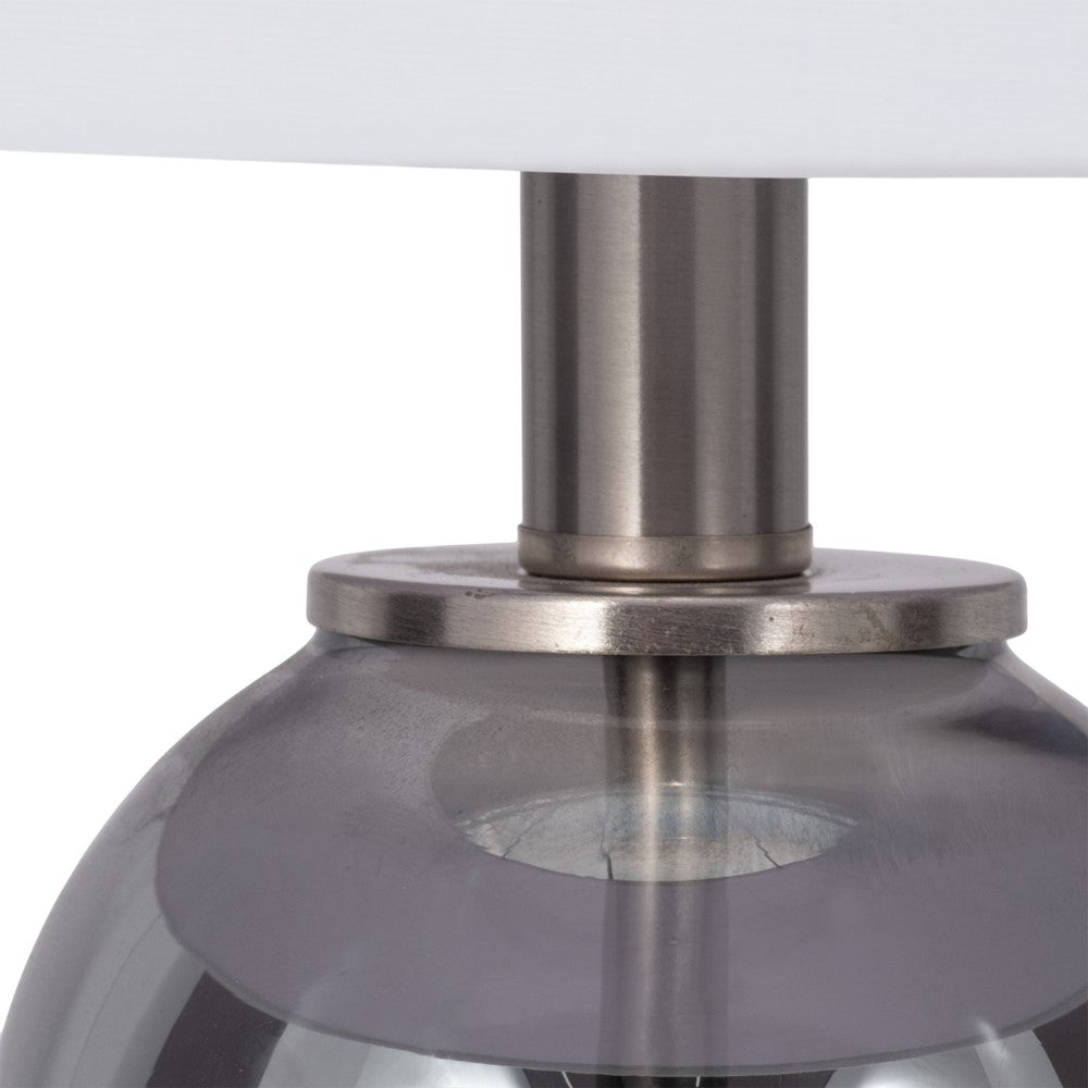 Close-up of a modern lamp with metallic accents.