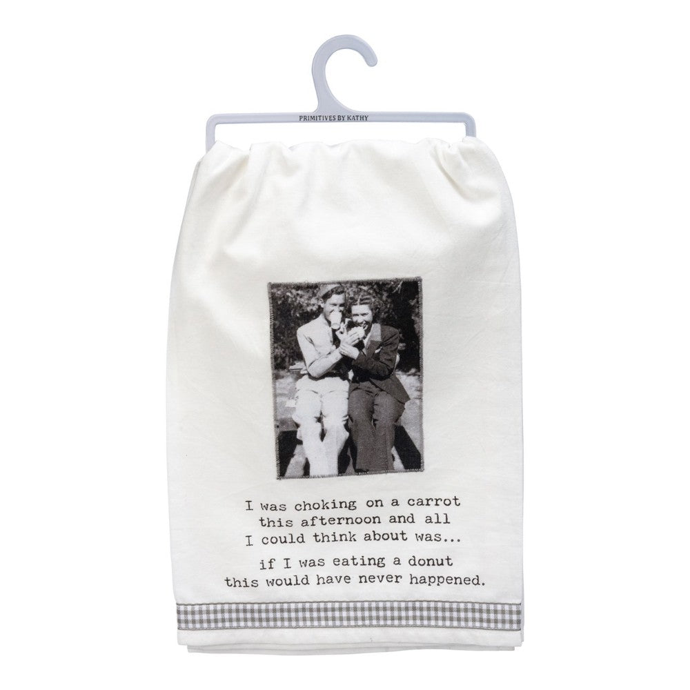 Two people on a towel with humorous text about choking on a carrot.