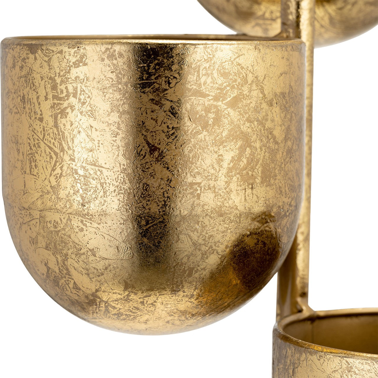 Textured gold metallic sphere close-up.