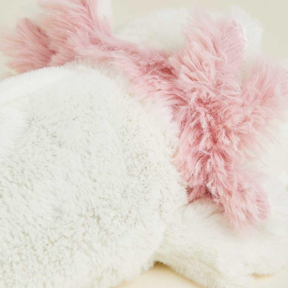 Close-up of soft white and pink fluffy textures.