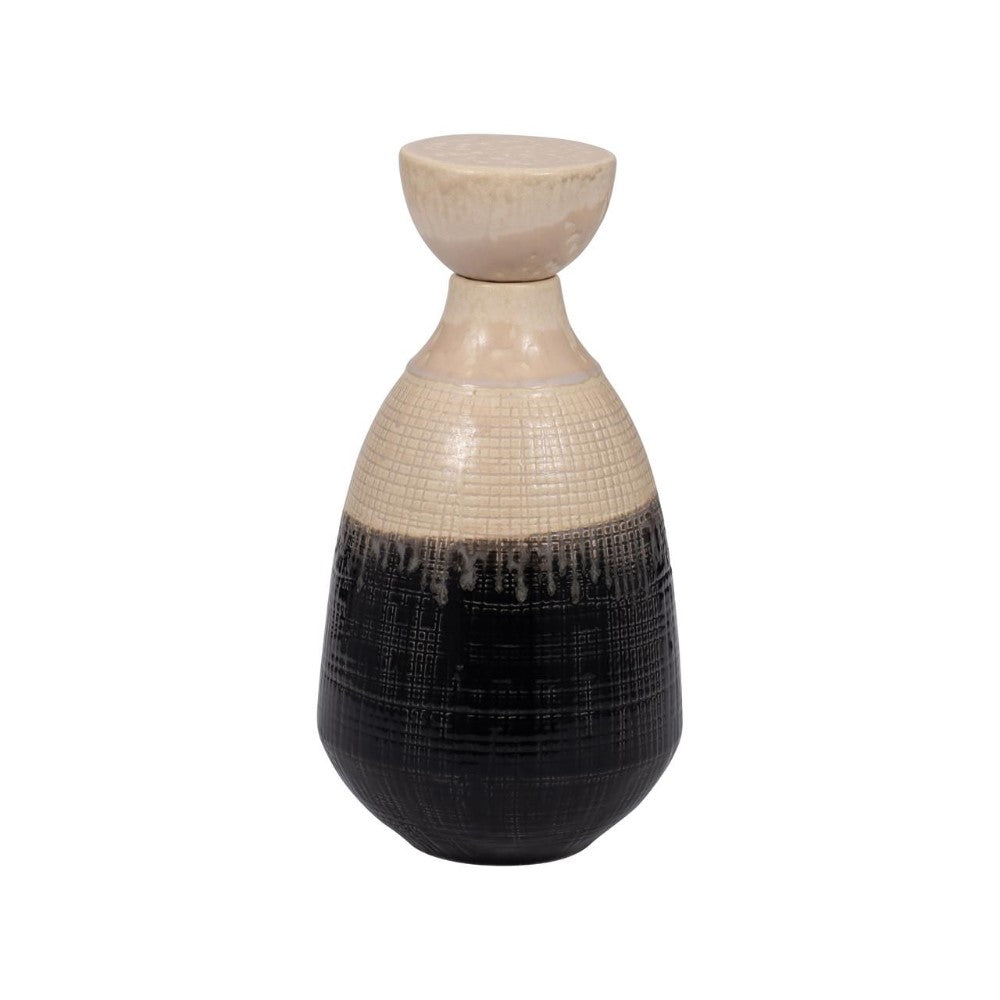 Ceramic vase with a rounded top, beige and black textured design.