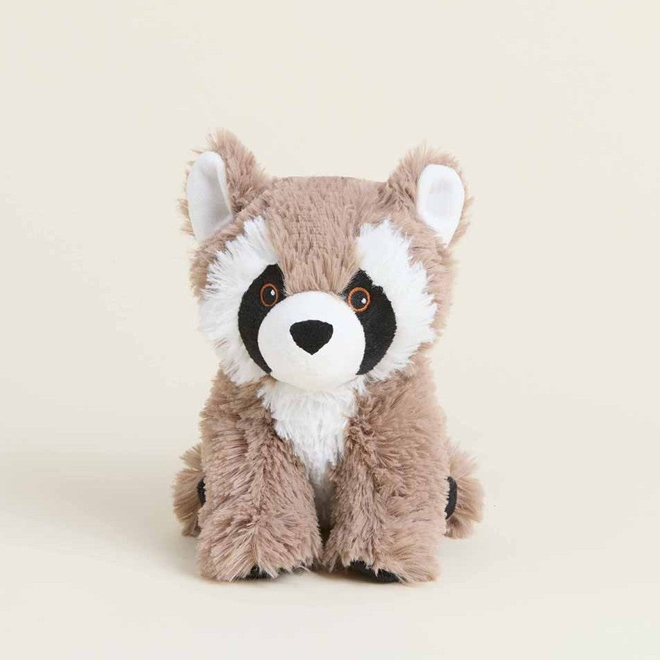 Fluffy raccoon plush toy with cute eyes.