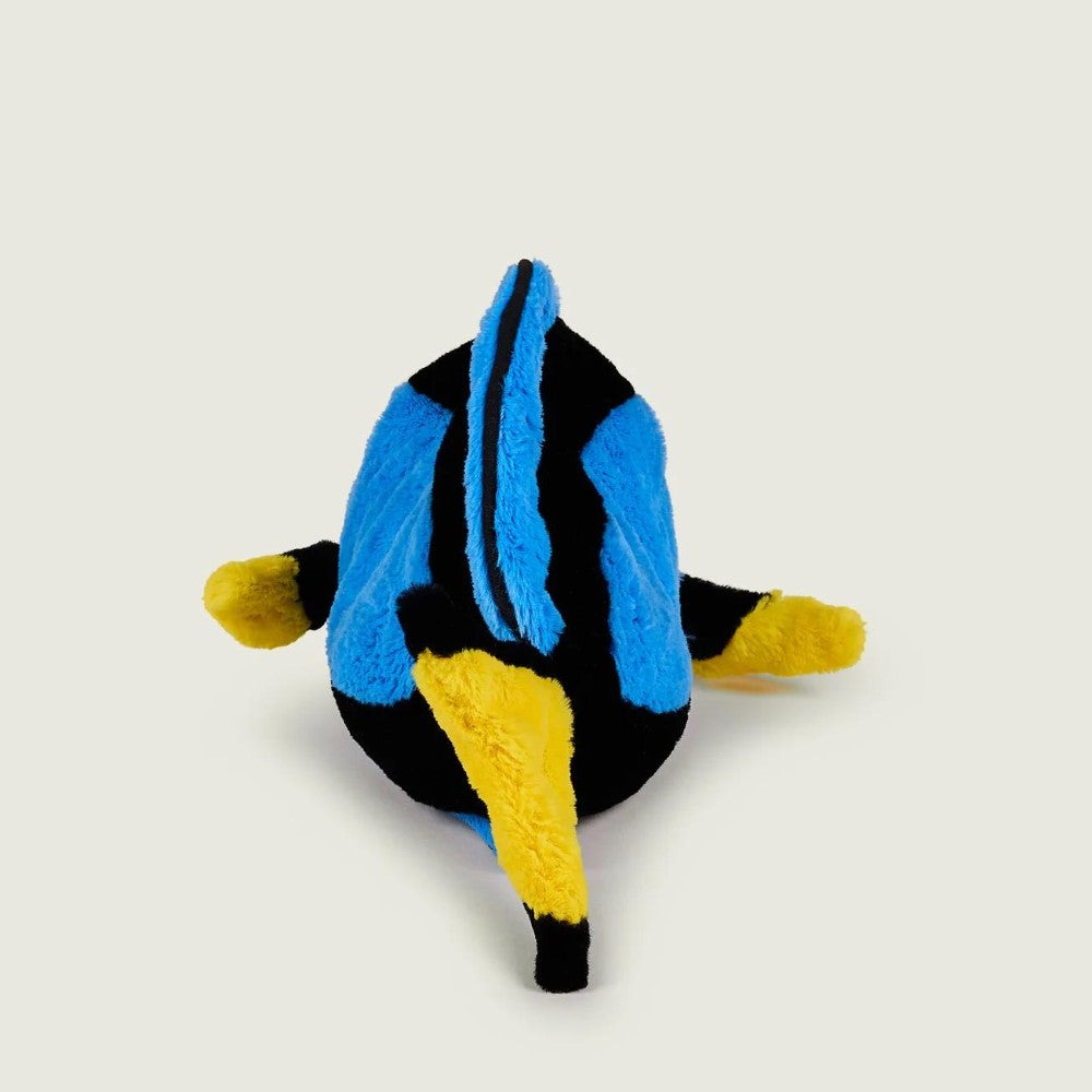 Plush toy fish with blue, yellow, and black colors on a plain background.