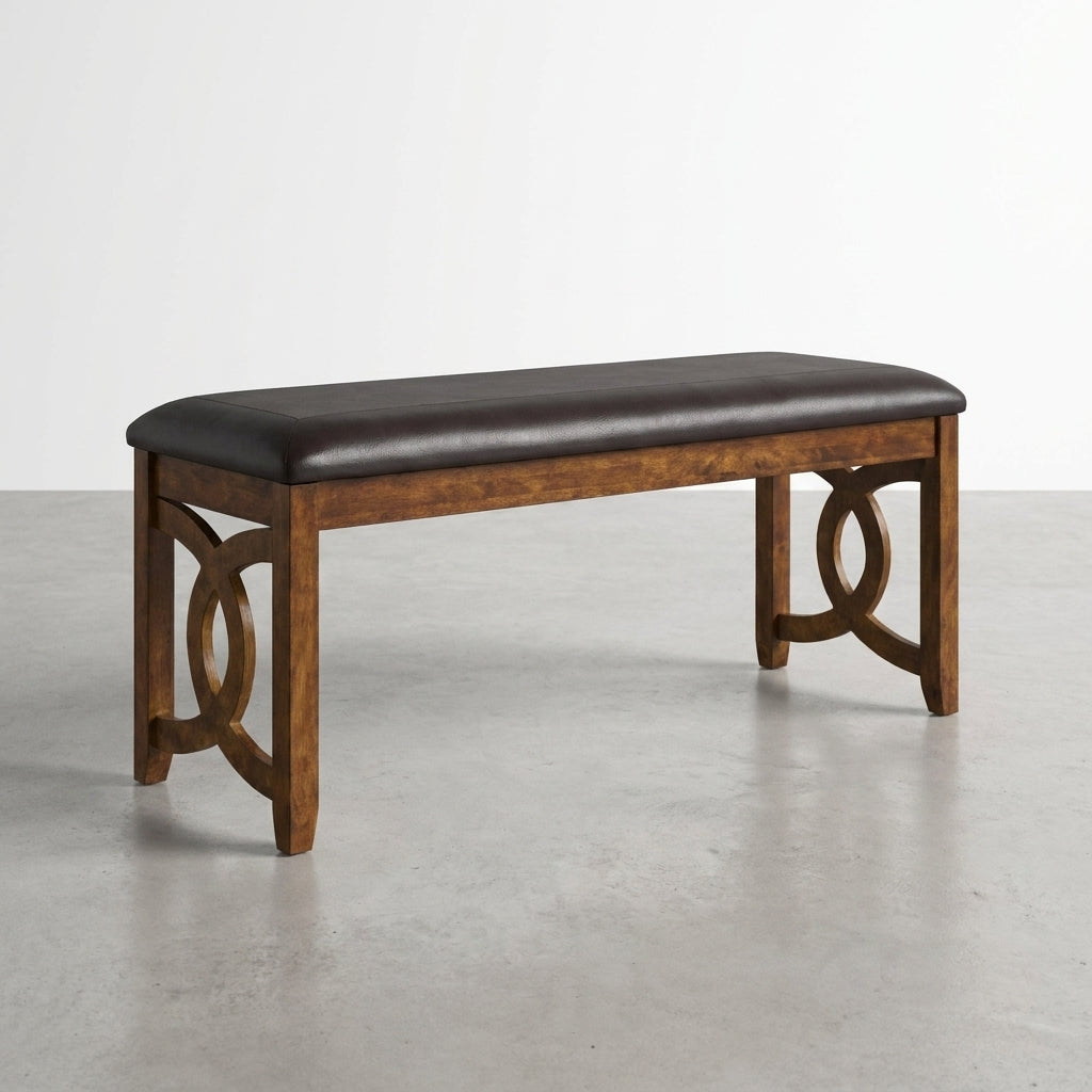 Wooden bench with black cushion and decorative side panels.