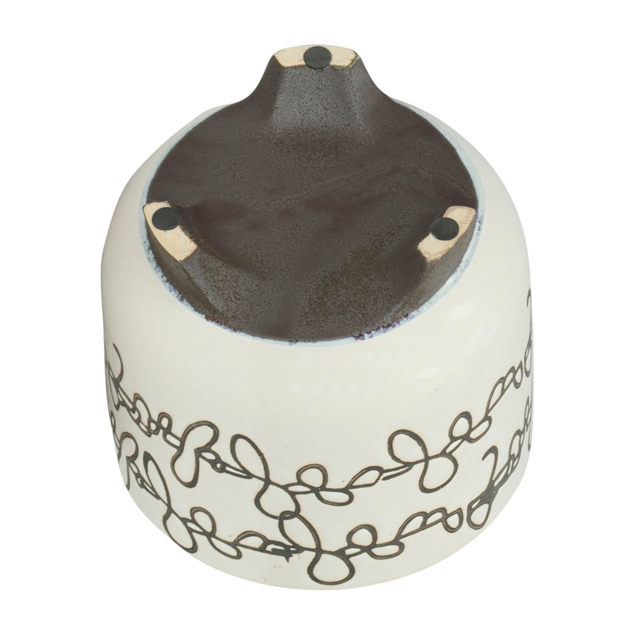 White ceramic base with a dark, textured top and floral line design.