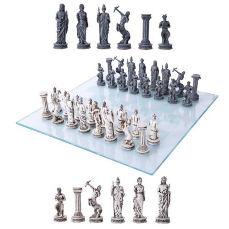 Chess set with statue-themed pieces on a glass board.