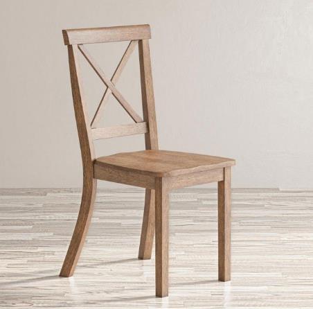 Wooden chair with an X-back design on a light wood floor.