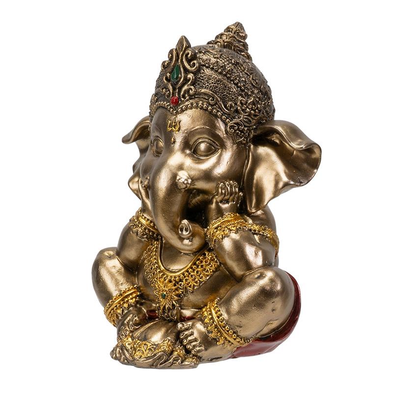 Bronze Ganesh statue, adorned with intricate gold accents and a jeweled crown.