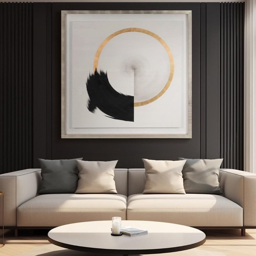 Minimalist living room with abstract art above a beige sofa.