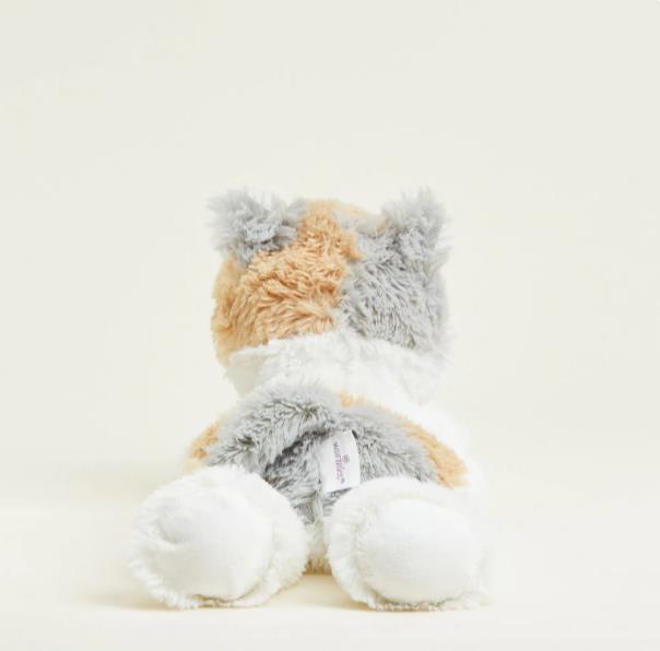 Fluffy multicolored stuffed animal viewed from behind.