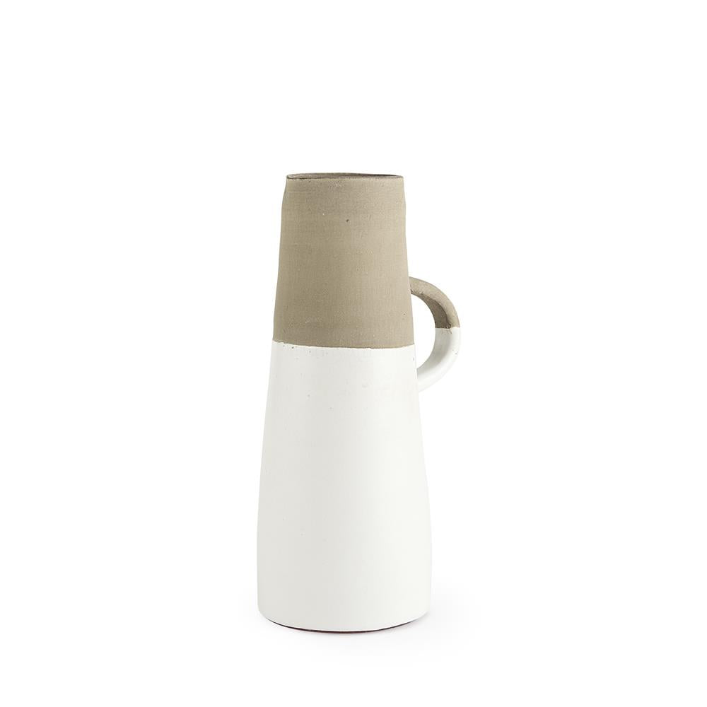 Two-tone ceramic jug with a minimalistic design and a small handle.