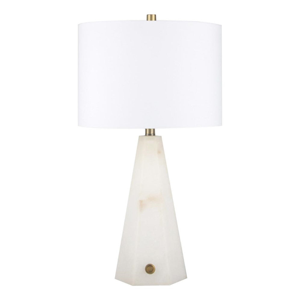Elegant lamp with a white geometric base and a large drum shade.