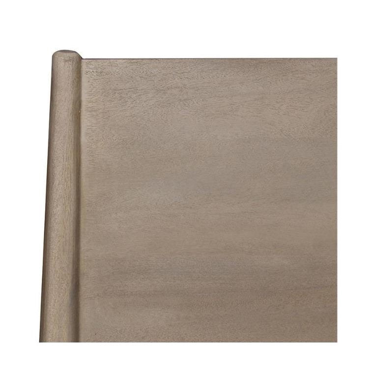 Close-up of a wooden surface with a smooth texture and light brown finish.