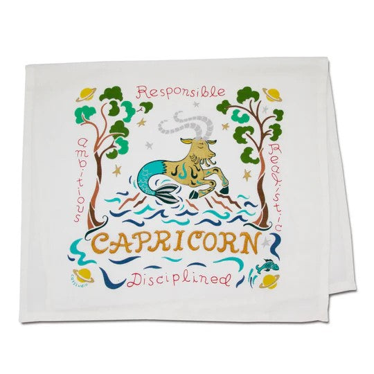 Capricorn design with a goat, words like Ambitious, Realistic, and colorful trees.