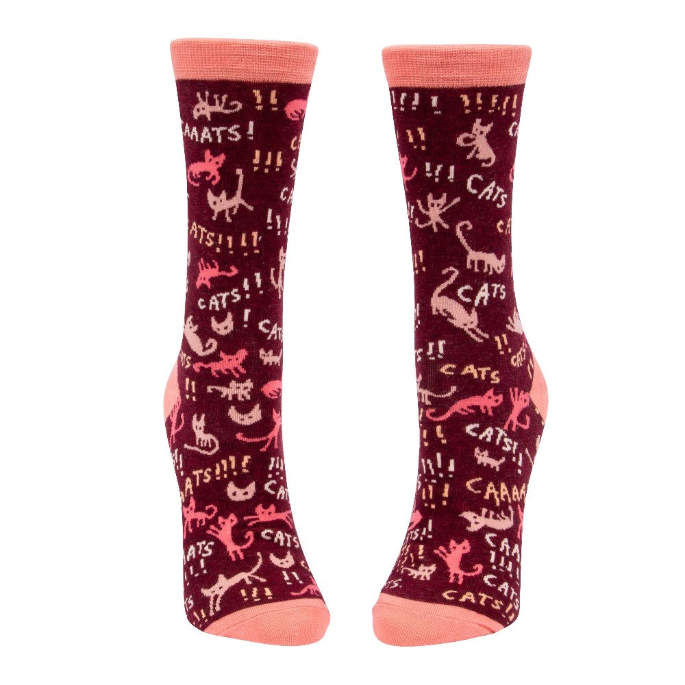 Red socks with cat designs and "CATS!" text.