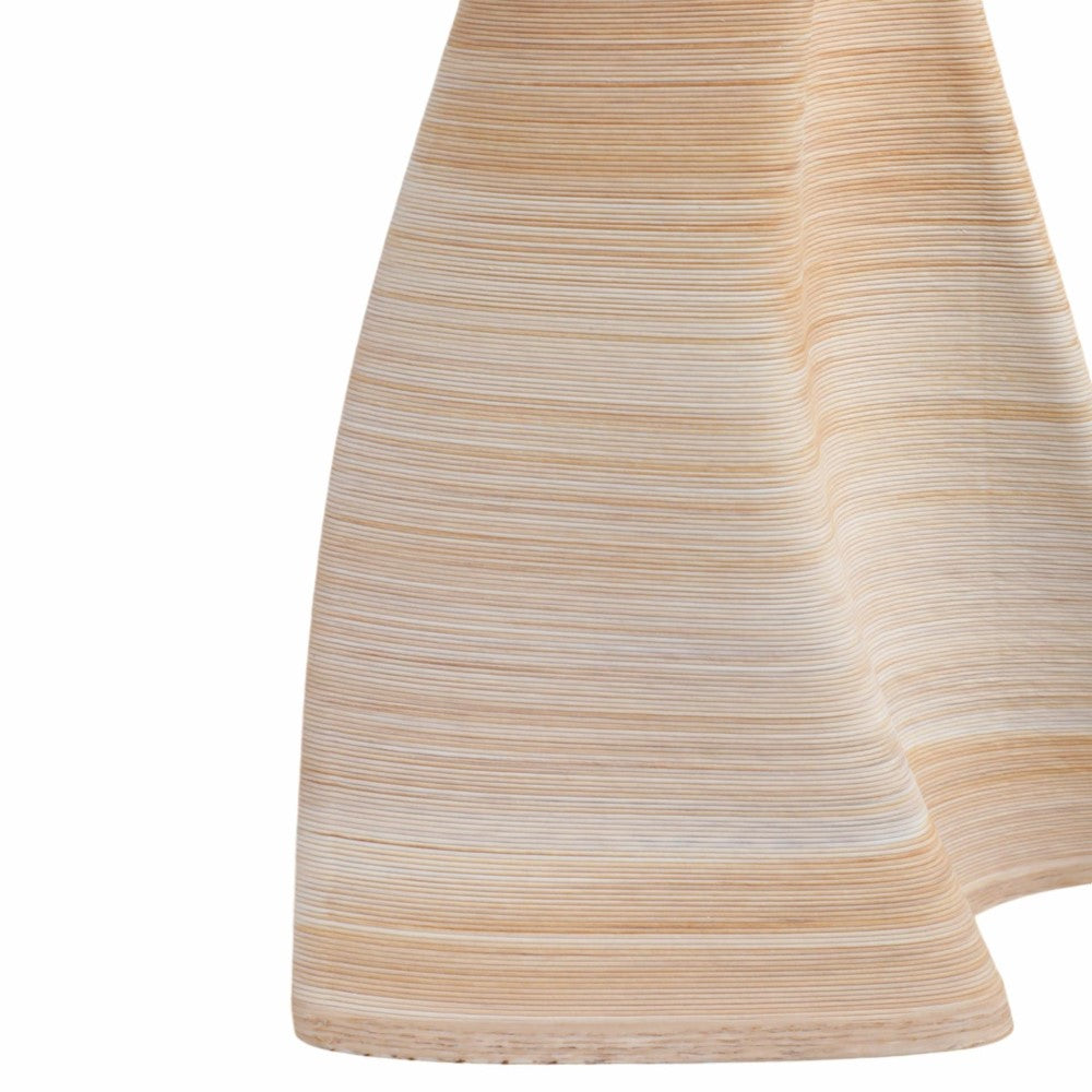 Curved, layered structure with a smooth, wooden texture.