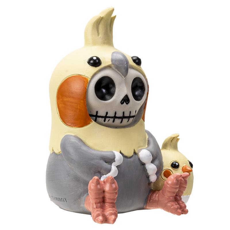 Skeleton cockatiel figure holding a smaller one.