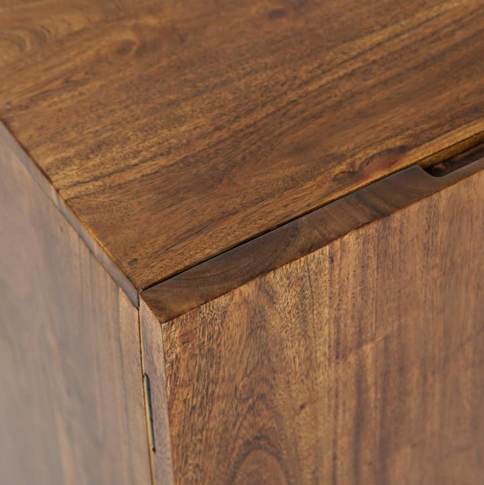 Close-up of smooth, wooden corner with a natural grain finish.