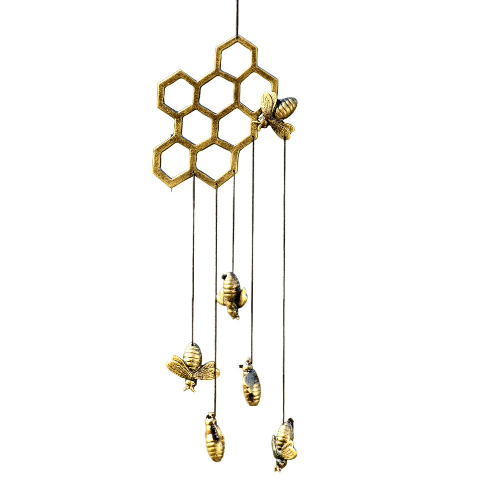 Honeycomb wind chime with hanging bees.