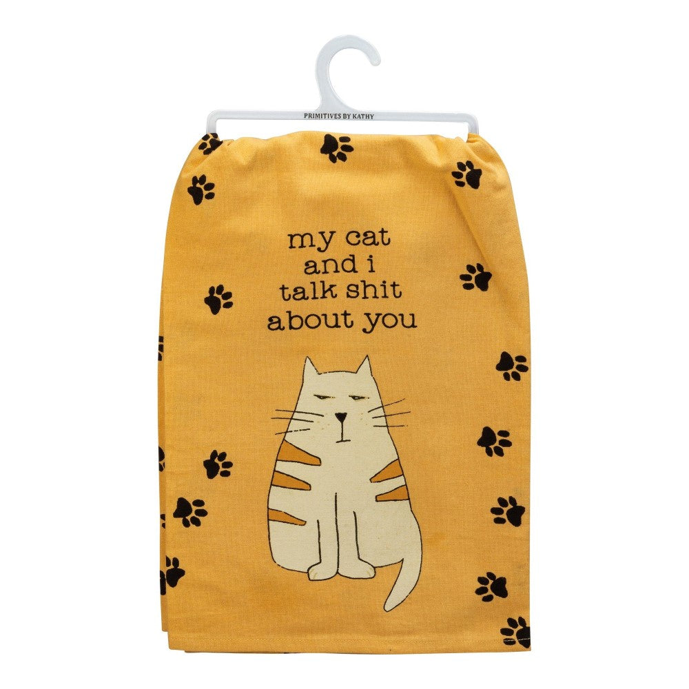 Yellow towel with a grumpy cat illustration and a humorous text.