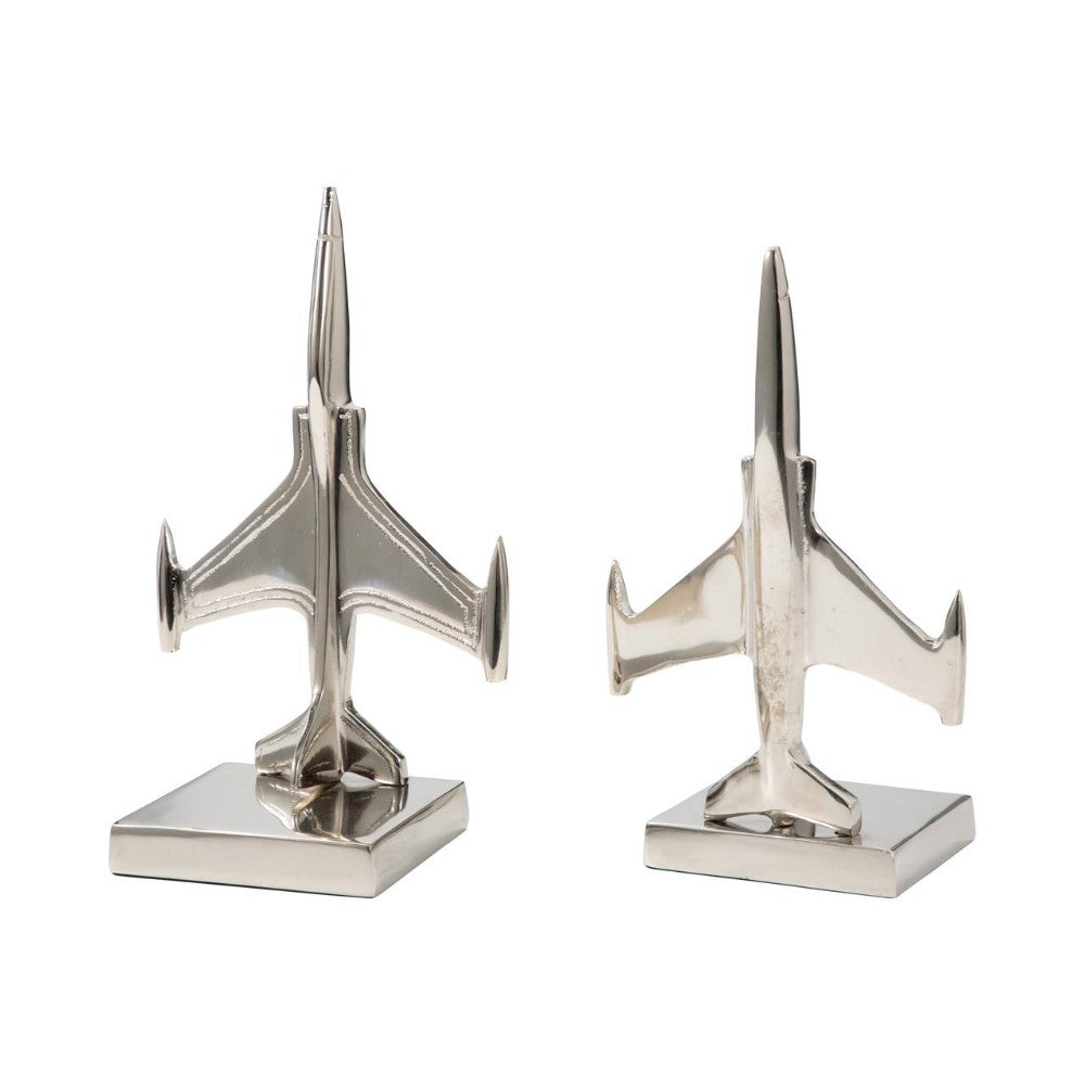 Two silver airplane bookends on square bases.