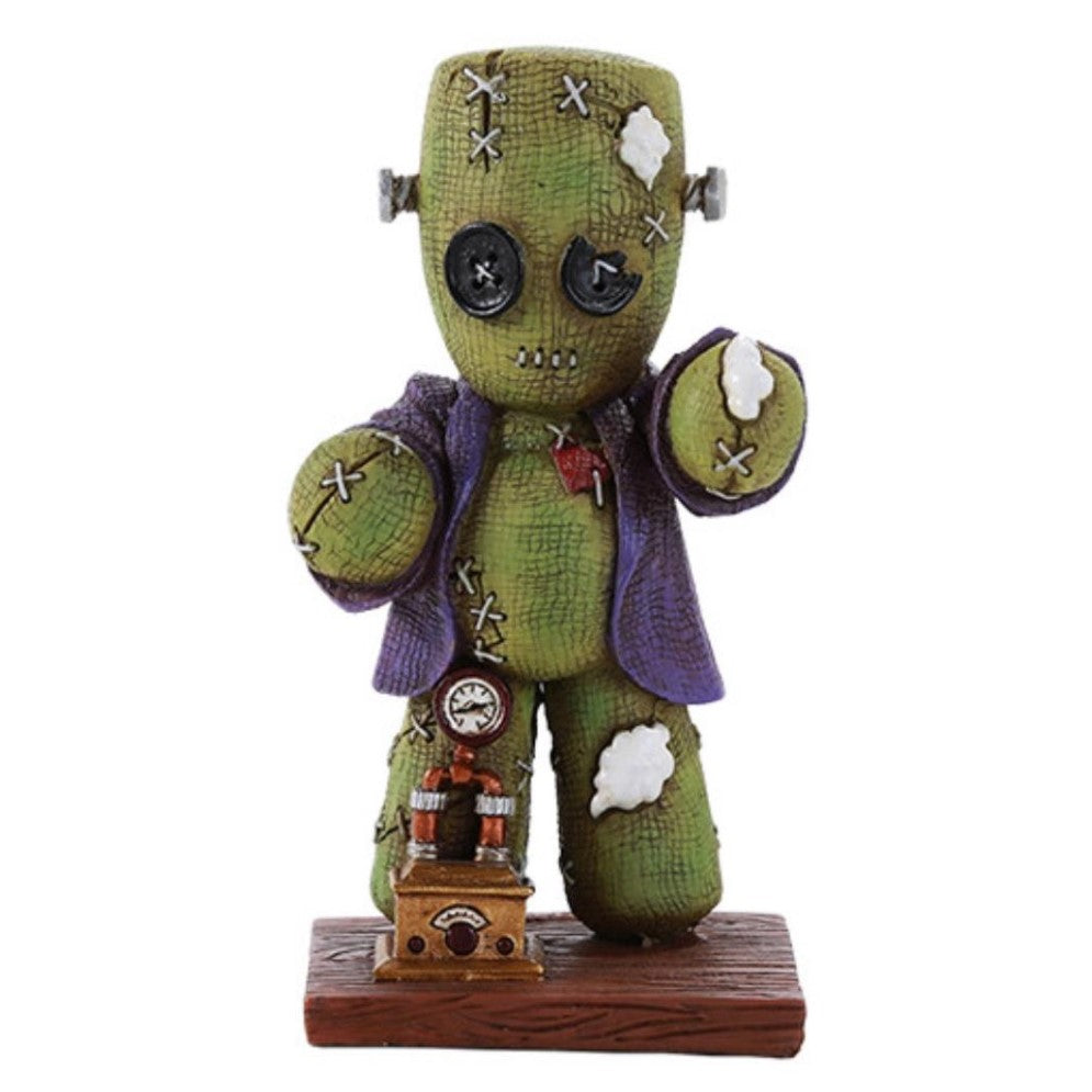 Cute Frankenstein figurine with button eyes and stitched details.
