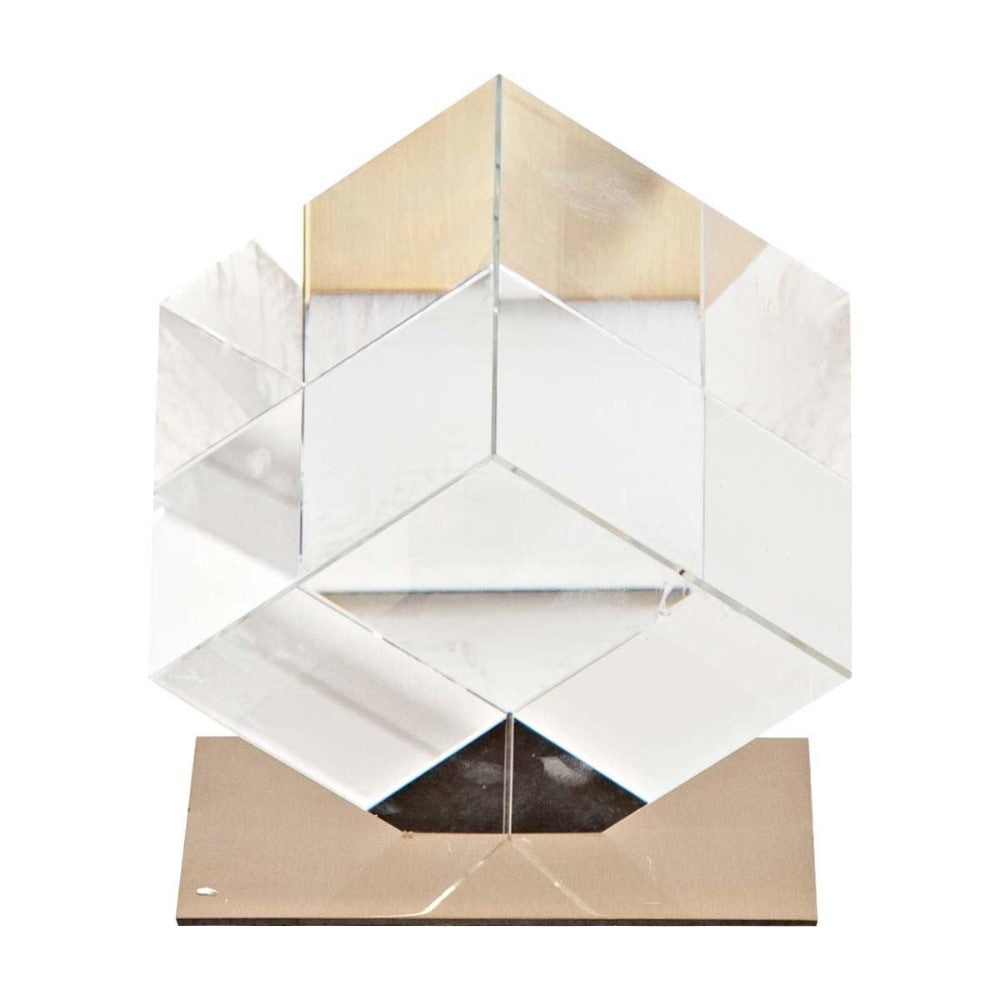 Transparent cube sculpture on a metallic base.