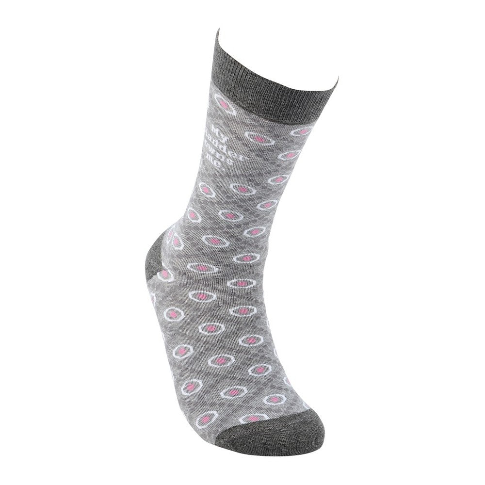 Gray sock with pink and white polka dots.