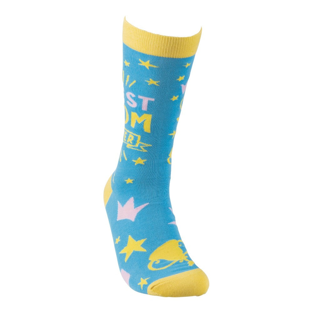 Bright blue sock with yellow and pink stars, crowns, and text design.