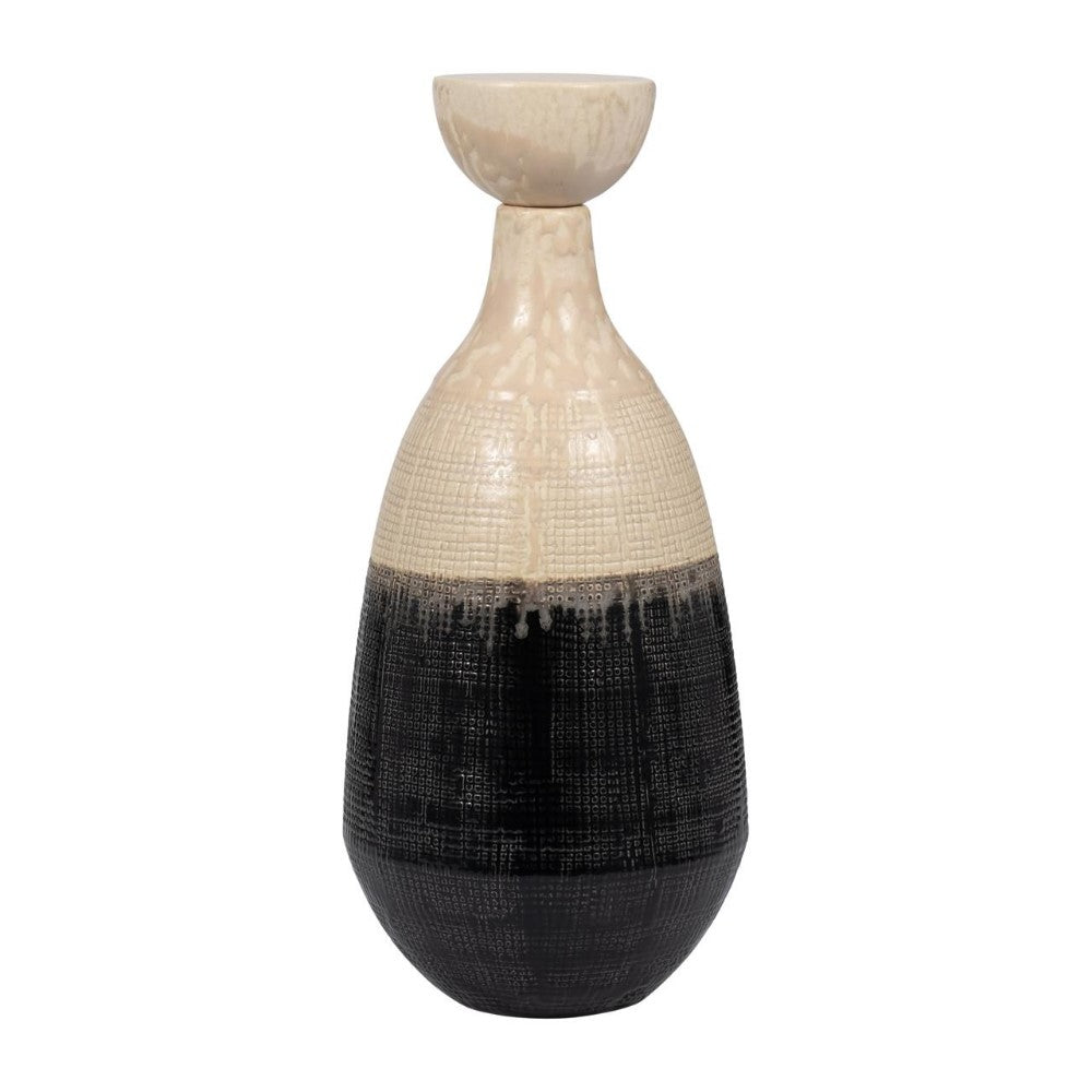 Two-tone, textured ceramic vase with a black and beige gradient design.